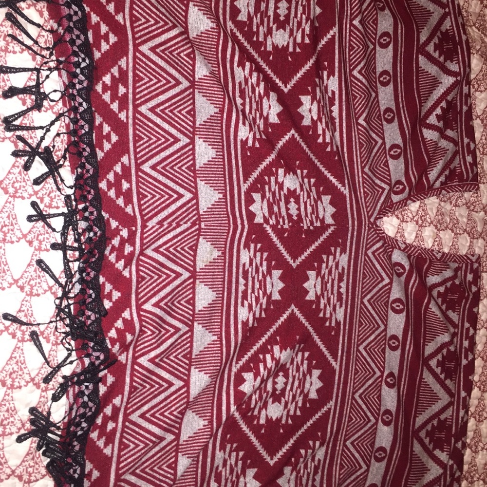Boho poncho with tassel trim